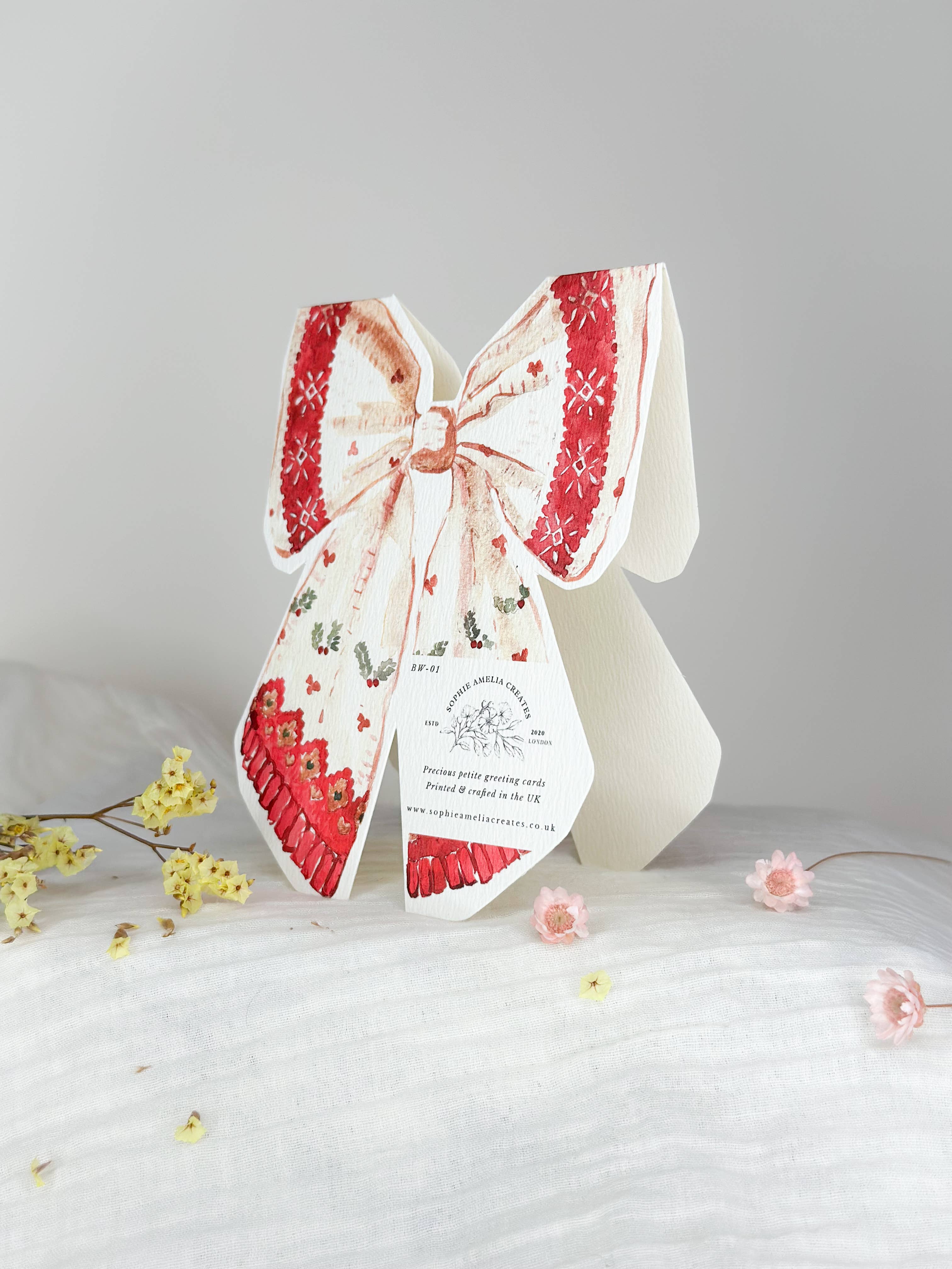 Vintage festive bow shaped Christmas card