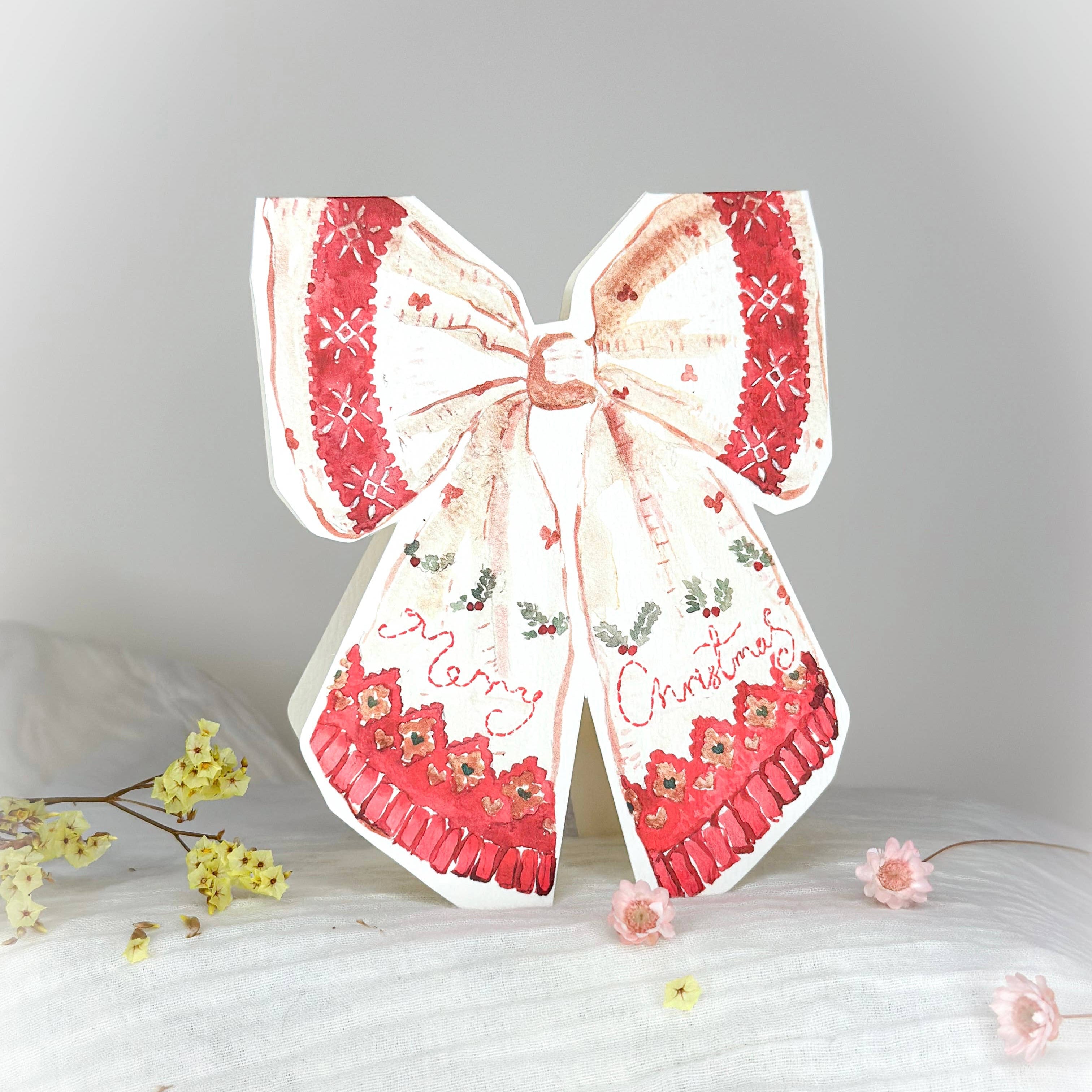 Vintage festive bow shaped Christmas card 